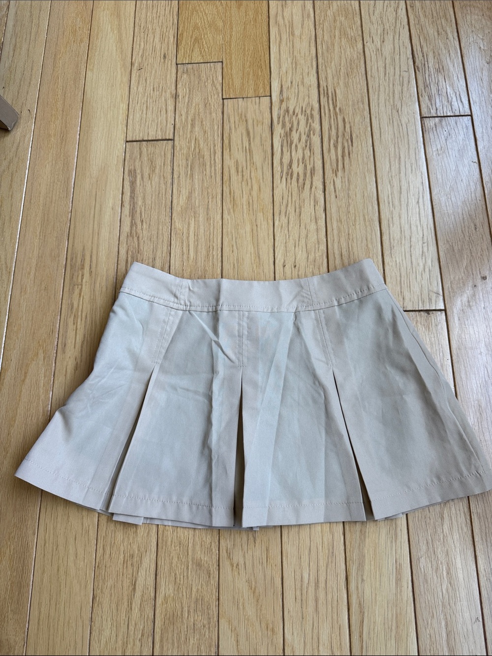 Beige Pleated Mini Skirt with shorts underneath